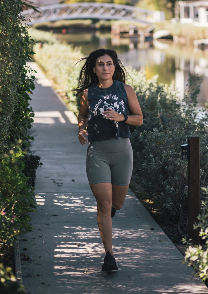 Sarah Marie Design Studio Shirts & Tops Woman on the Run Racerback Crop Tank